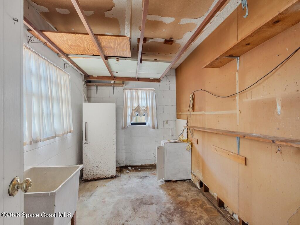 1076 Madrid Road Rockledge, FL 32955 - Photo 12 of 30 a view of a storage & utility room