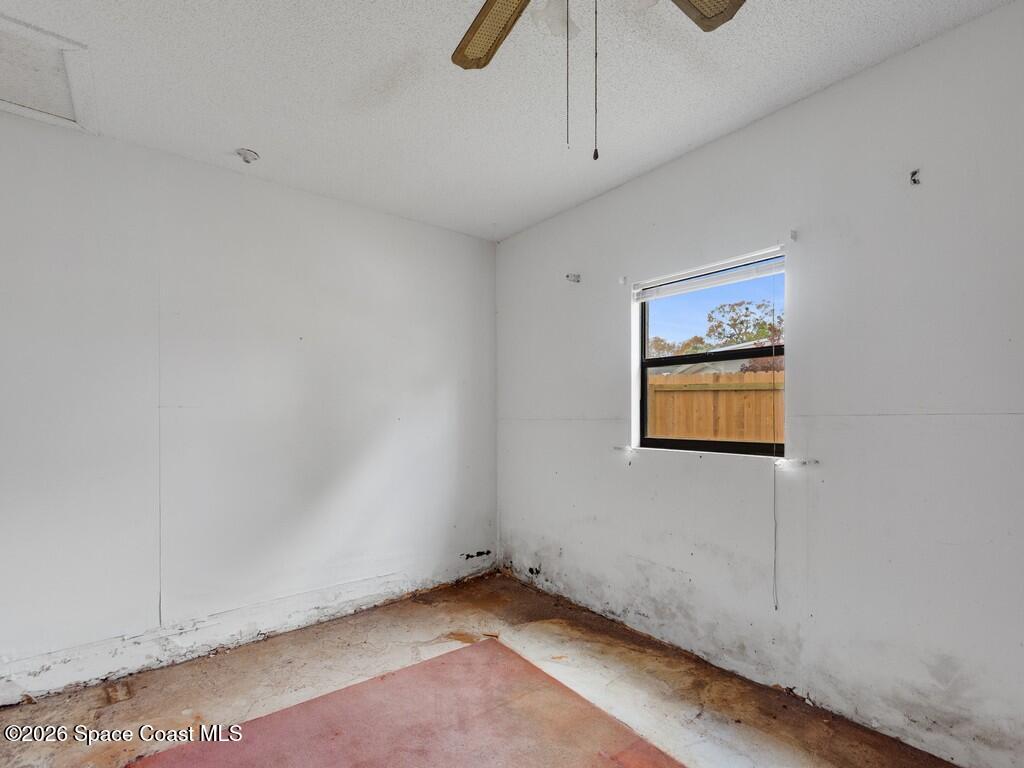 1076 Madrid Road Rockledge, FL 32955 - Photo 14 of 30 a view of an empty room