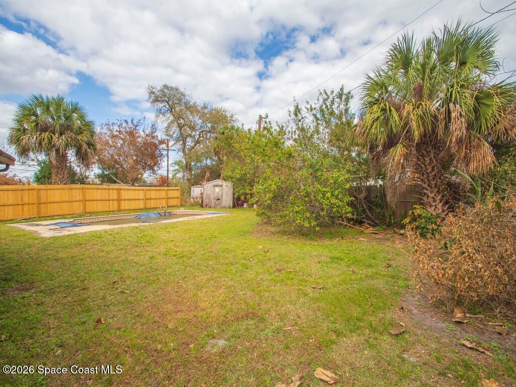 1076 Madrid Road Rockledge, FL 32955 - Photo 22 of 30 a view of an ocean and beach
