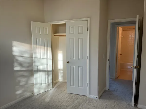 a view of a bathroom with sliding glass door
