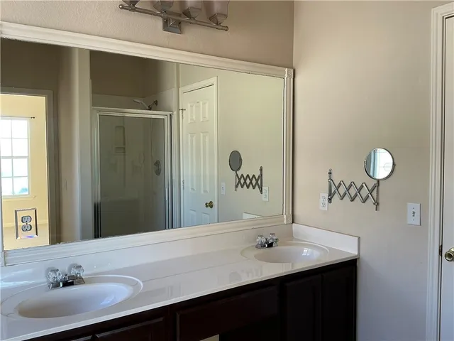 a bathroom with a bathtub and window