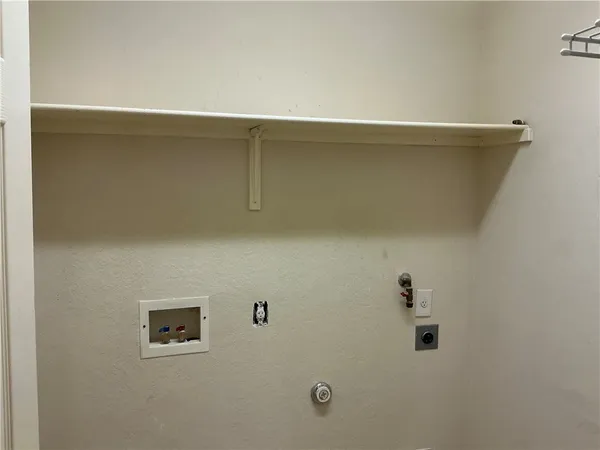 a bathroom with a sink a large mirror and a shower