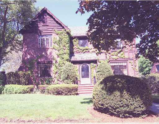 23 Arlington Road Brookline, MA 02467 - Photo 1 of 1 a front view of a house with a yard