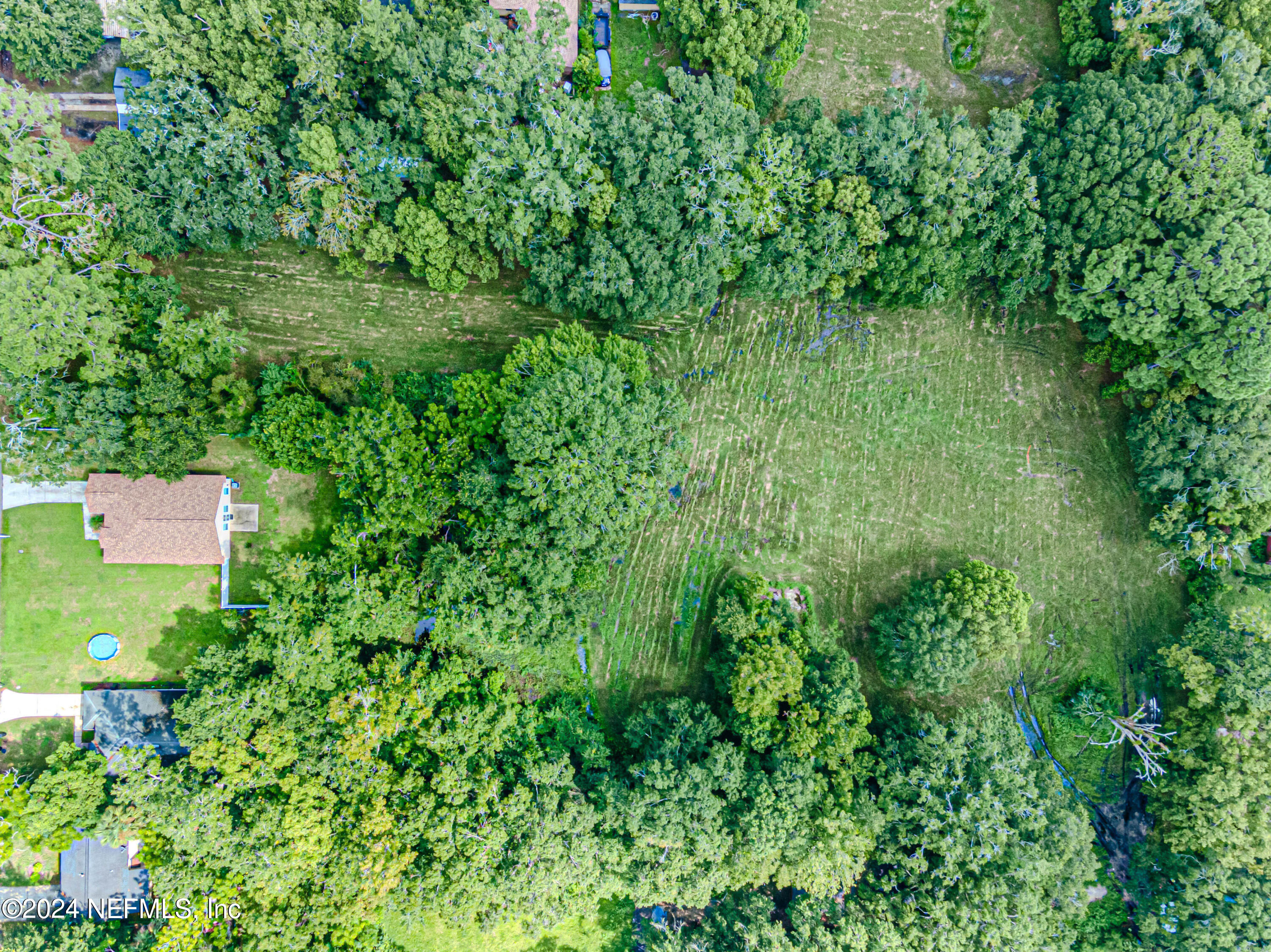 0 Detroit Street Jacksonville, FL 32254 - Photo 5 of 15 an aerial view of residential house with outdoor space and trees all around