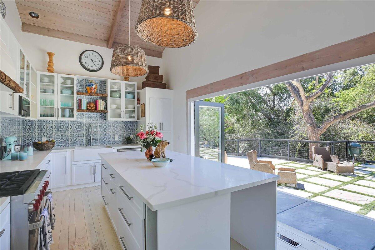 2253 Las Canoas Road Santa Barbara, CA 93105 - Photo 17 of 53 a view of a kitchen with a sink and a large window