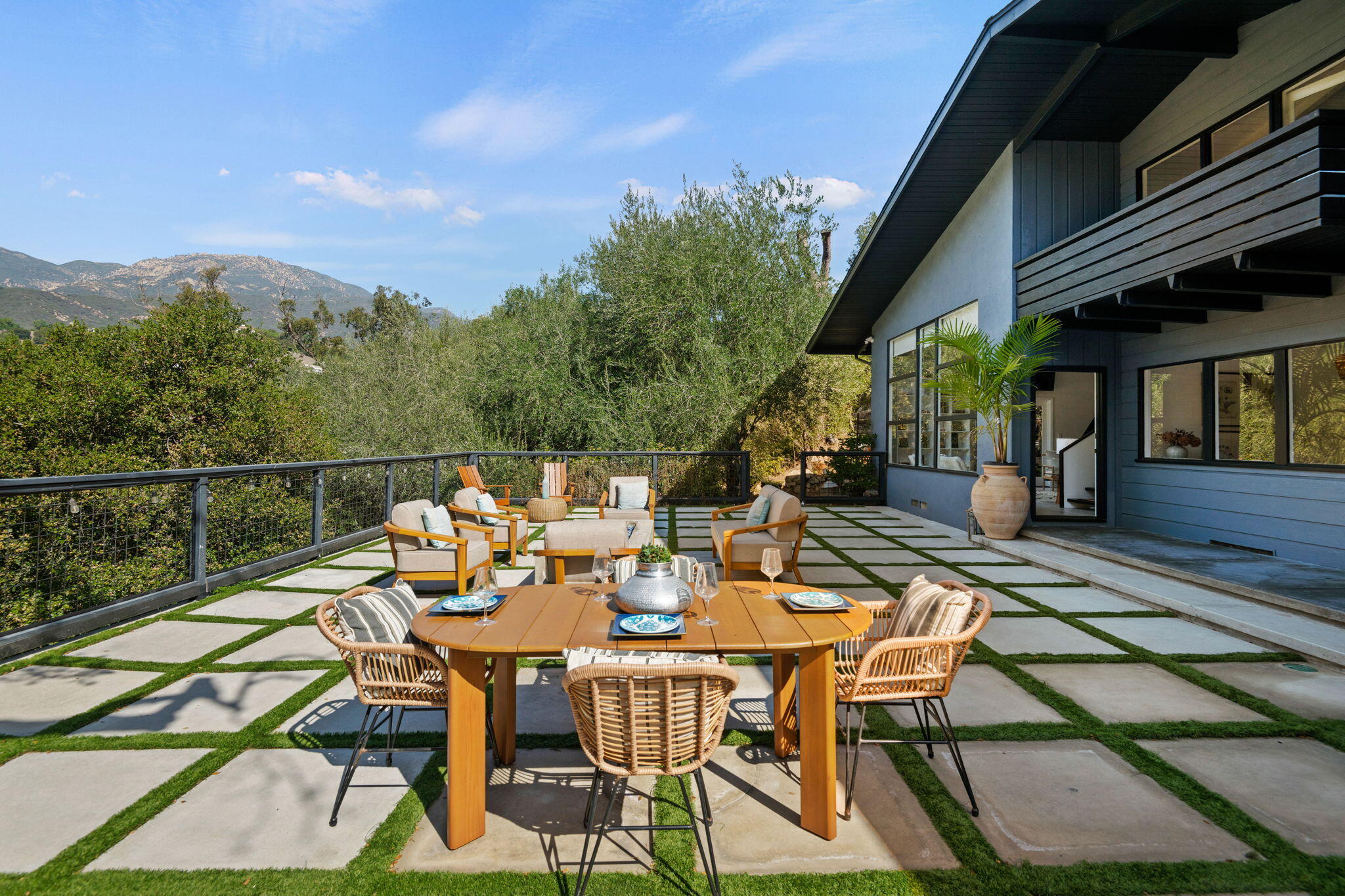 2253 Las Canoas Road Santa Barbara, CA 93105 - Photo 19 of 53 a view of a dinning tables and chairs in the patio