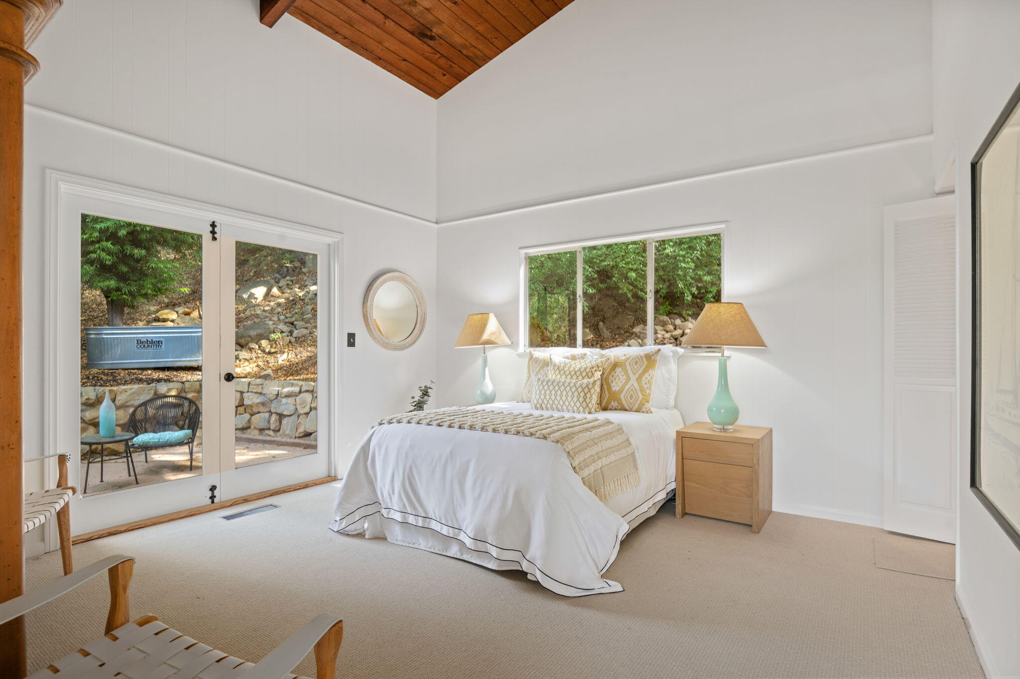2253 Las Canoas Road Santa Barbara, CA 93105 - Photo 27 of 53 a bedroom with a large bed and a large window