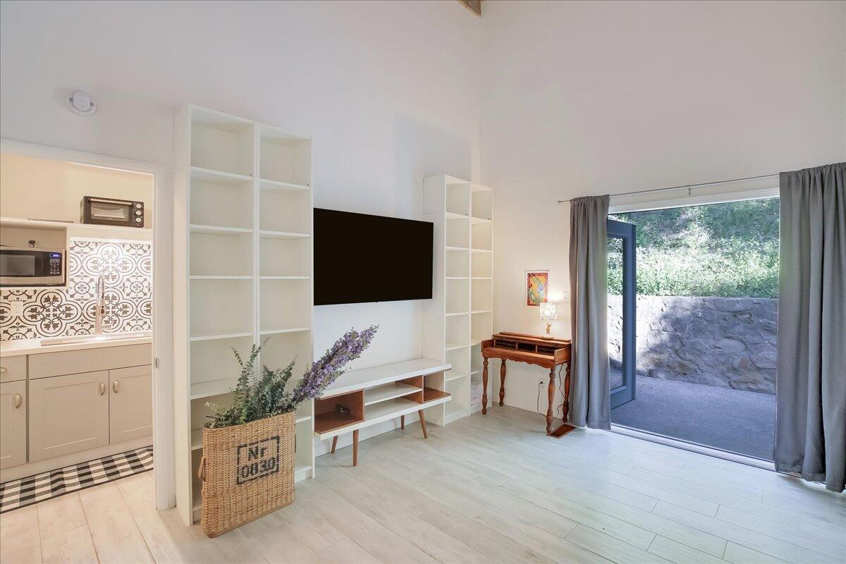 2253 Las Canoas Road Santa Barbara, CA 93105 - Photo 35 of 53 a living room with furniture and a flat screen tv
