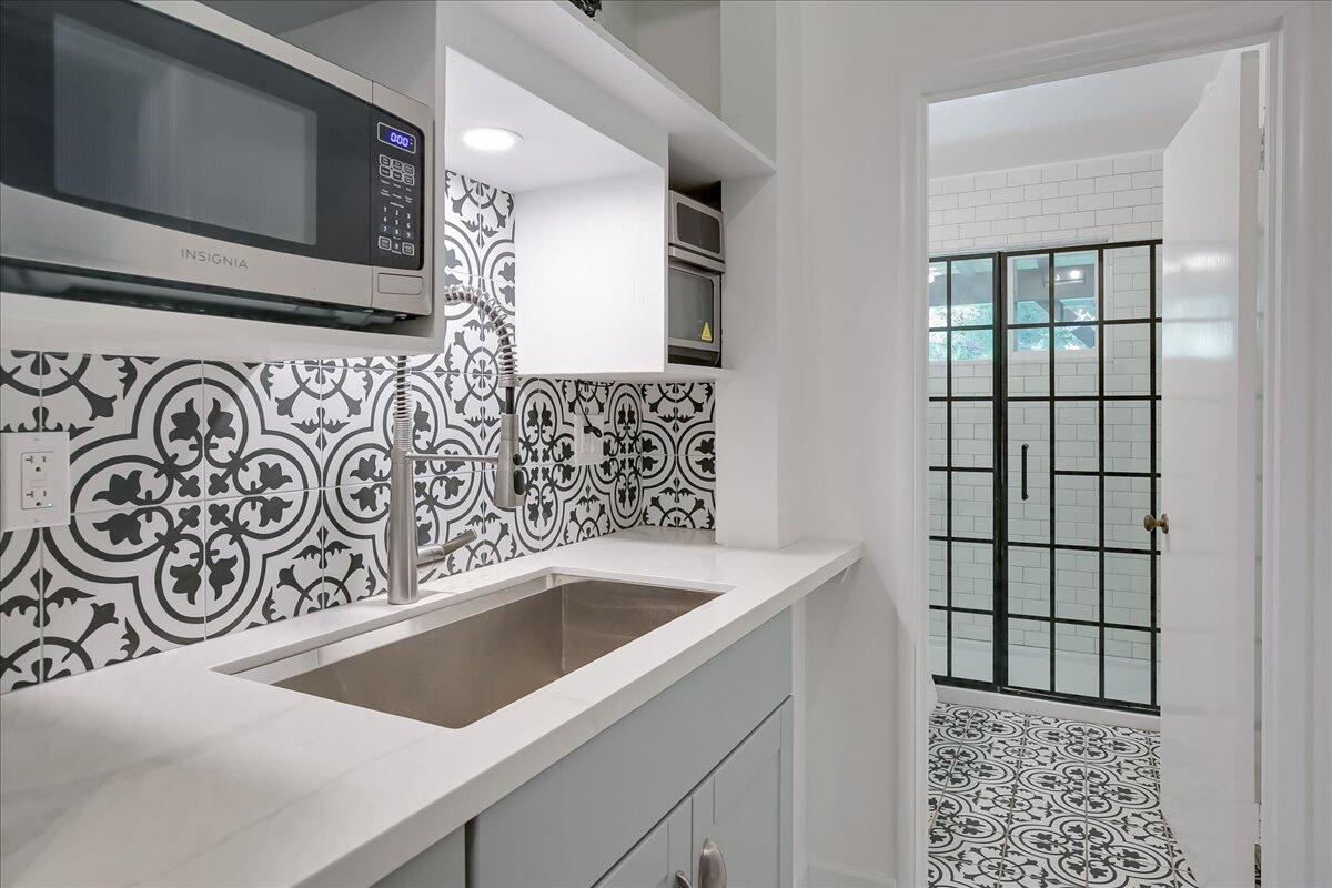 2253 Las Canoas Road Santa Barbara, CA 93105 - Photo 38 of 53 a view of a sink and a microwave