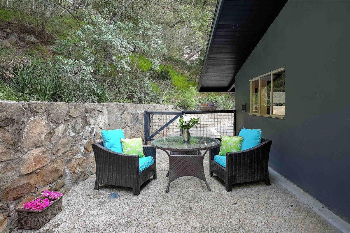 2253 Las Canoas Road Santa Barbara, CA 93105 - Photo 41 of 53 a view of a house with backyard sitting area and tub