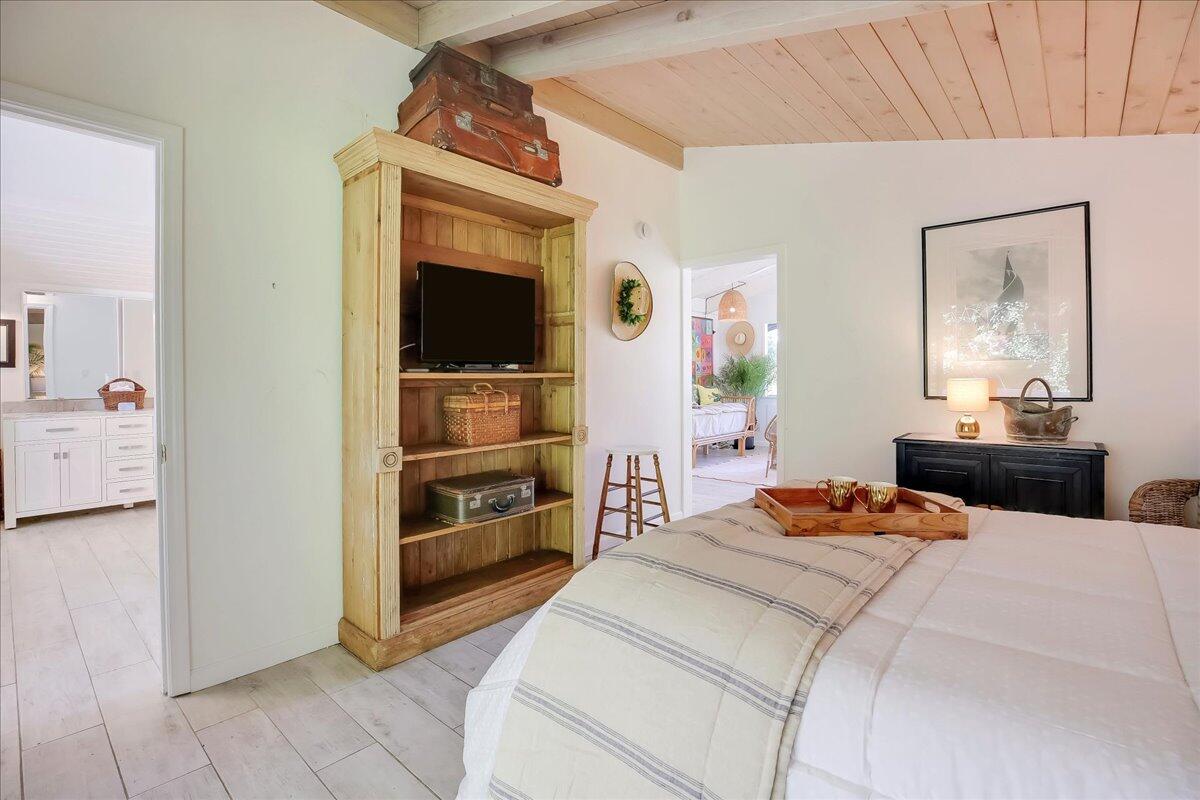 2253 Las Canoas Road Santa Barbara, CA 93105 - Photo 43 of 53 a bedroom with a bed and a television