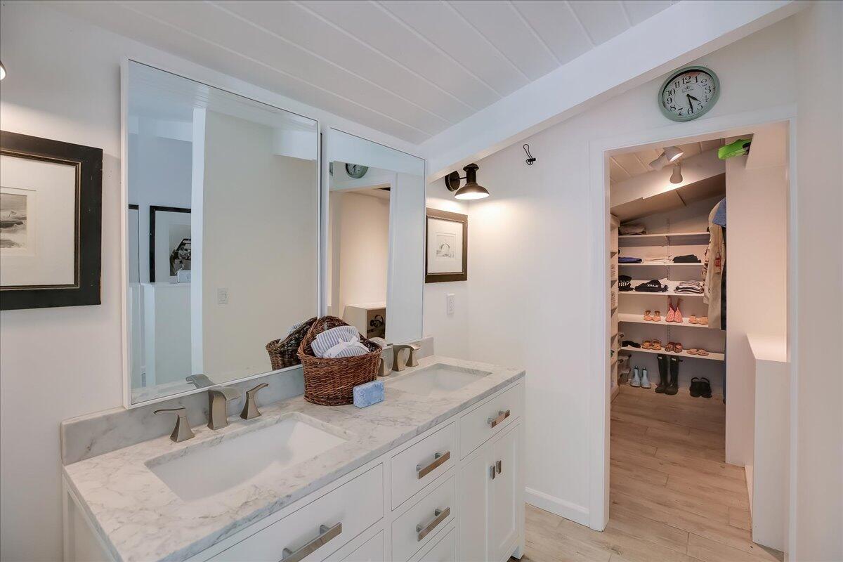 2253 Las Canoas Road Santa Barbara, CA 93105 - Photo 44 of 53 a bathroom with a sink double vanity and a mirror