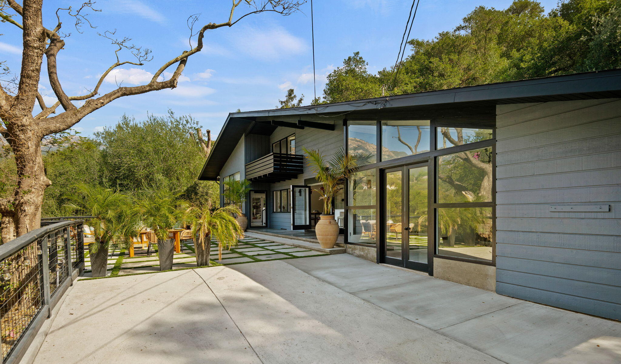 2253 Las Canoas Road Santa Barbara, CA 93105 - Photo 9 of 53 a front view of a house with a yard