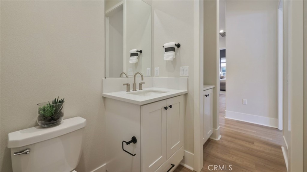 4971 Rideline Road Yorba Linda, CA 92887 - Photo 23 of 33 a bathroom with a sink a toilet and shower