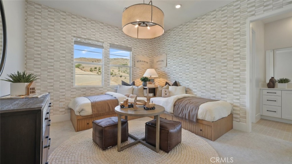 4971 Rideline Road Yorba Linda, CA 92887 - Photo 24 of 33 a living room with furniture and a chandelier