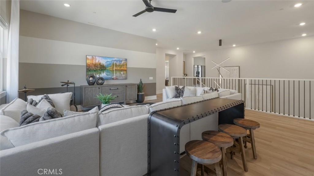 4971 Rideline Road Yorba Linda, CA 92887 - Photo 26 of 33 a living room with furniture and a flat screen tv