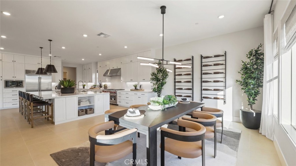 4971 Rideline Road Yorba Linda, CA 92887 - Photo 5 of 33 a kitchen with a table and chairs