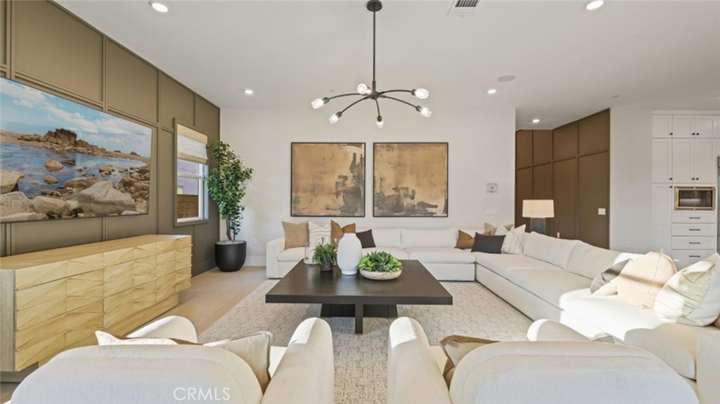 4971 Rideline Road Yorba Linda, CA 92887 - Photo 9 of 33 a living room with furniture wooden floor and a large window