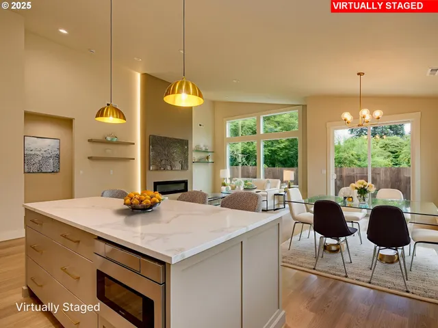 a view of a kitchen with a sink and a stove