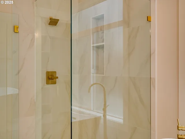 a view of an empty room with a closet