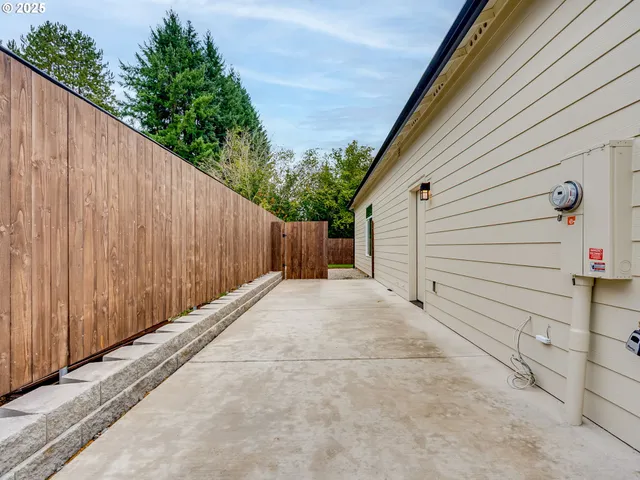 a view of a backyard with furniture