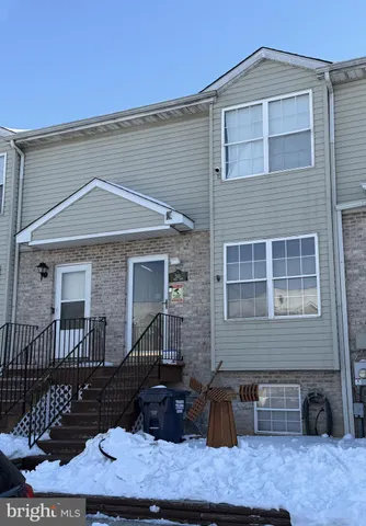 a front view of a house with patio
