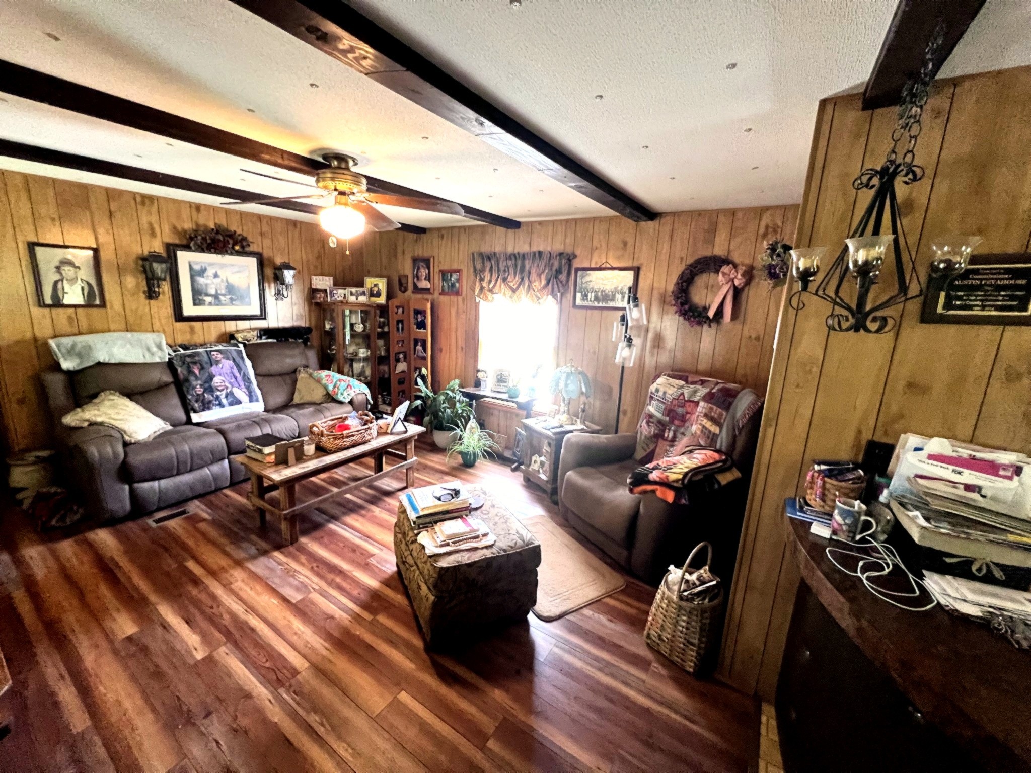 1133 Culps Bend Road Clifton, TN 38425 - Photo 15 of 51 a living room with furniture and a flat screen tv