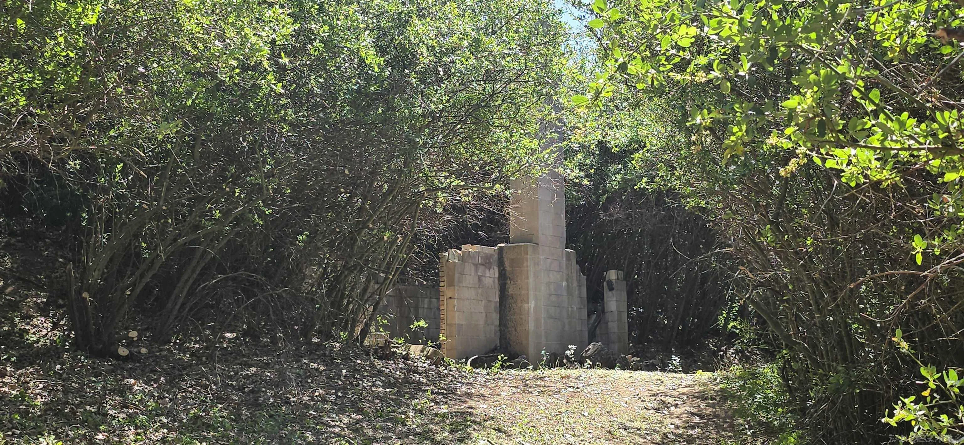 38 Creek Road, Unit 66 13 Julian, CA 92036 - Photo 6 of 16 a view of a tree in front of a house