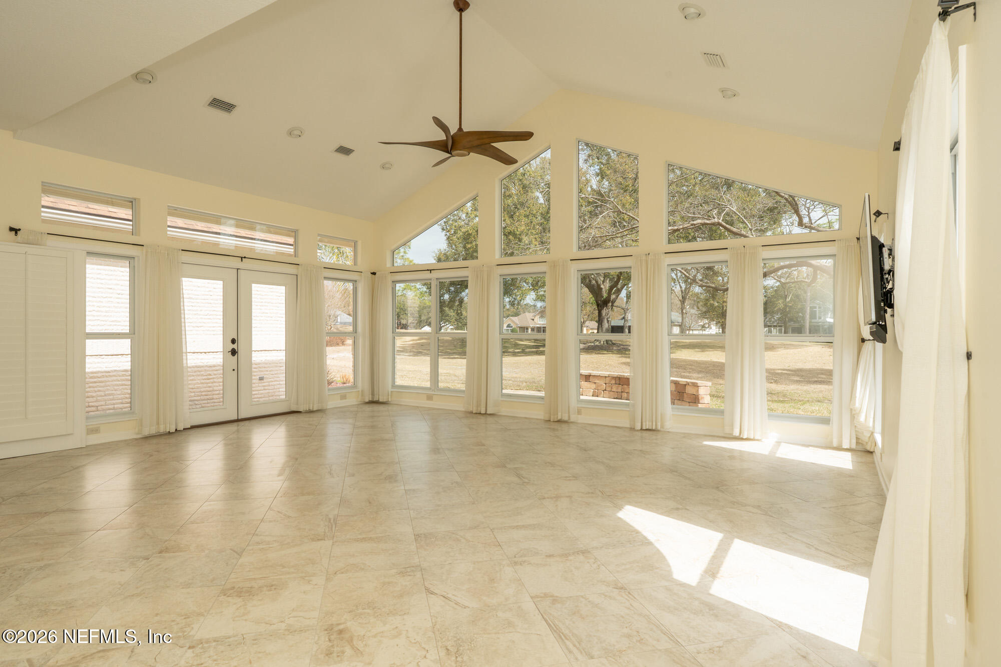13177 Cricket Cove Road North Jacksonville, FL 32224 - Photo 21 of 39 a view of an empty room with a window