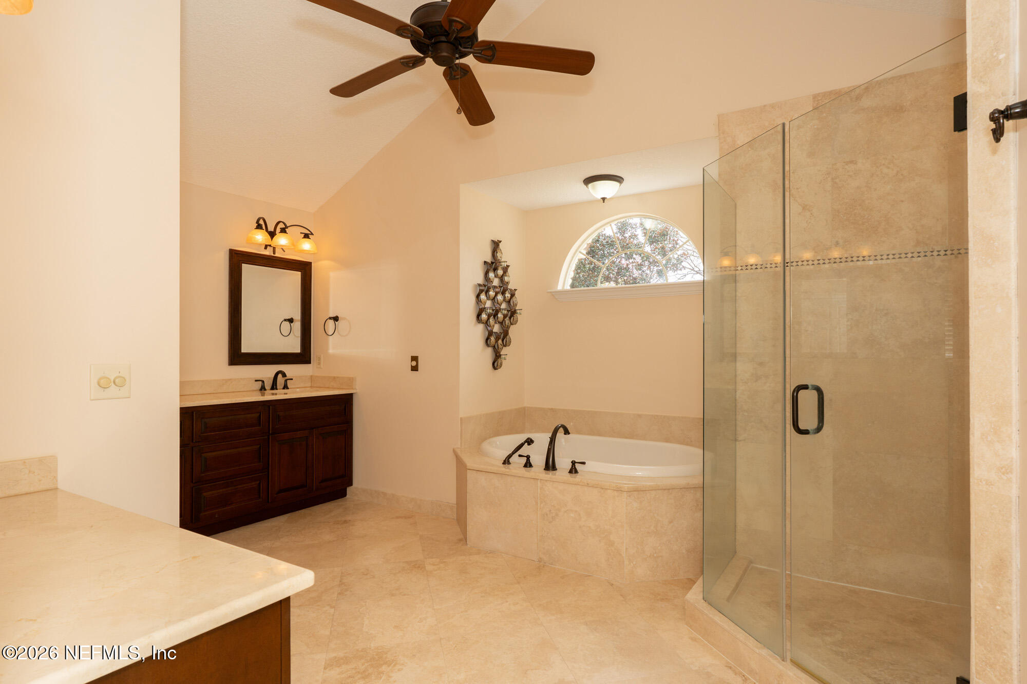 13177 Cricket Cove Road North Jacksonville, FL 32224 - Photo 25 of 39 a bathroom with a bathtub and a shower