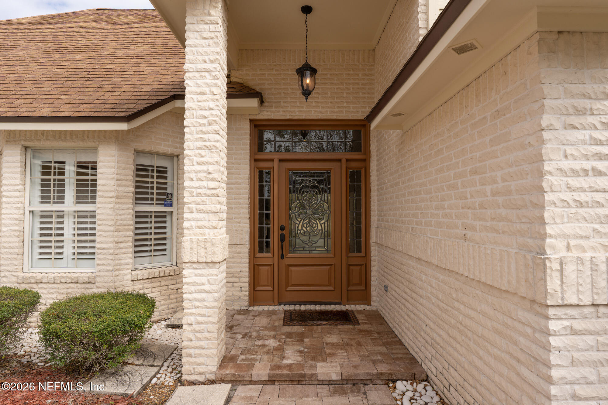 13177 Cricket Cove Road North Jacksonville, FL 32224 - Photo 6 of 39 a front view of a house with a outdoor
