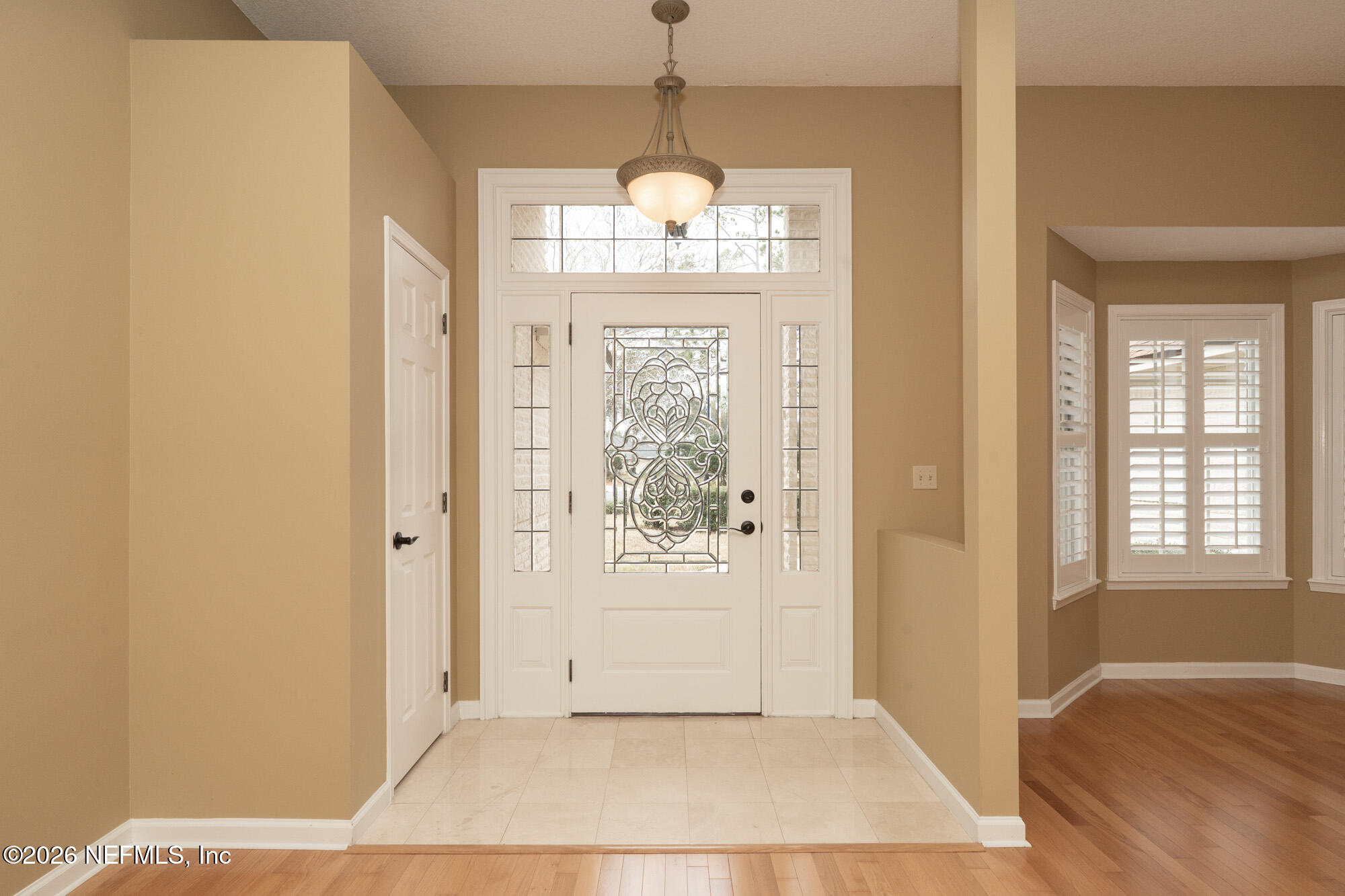 13177 Cricket Cove Road North Jacksonville, FL 32224 - Photo 8 of 39 a view of an empty room with window
