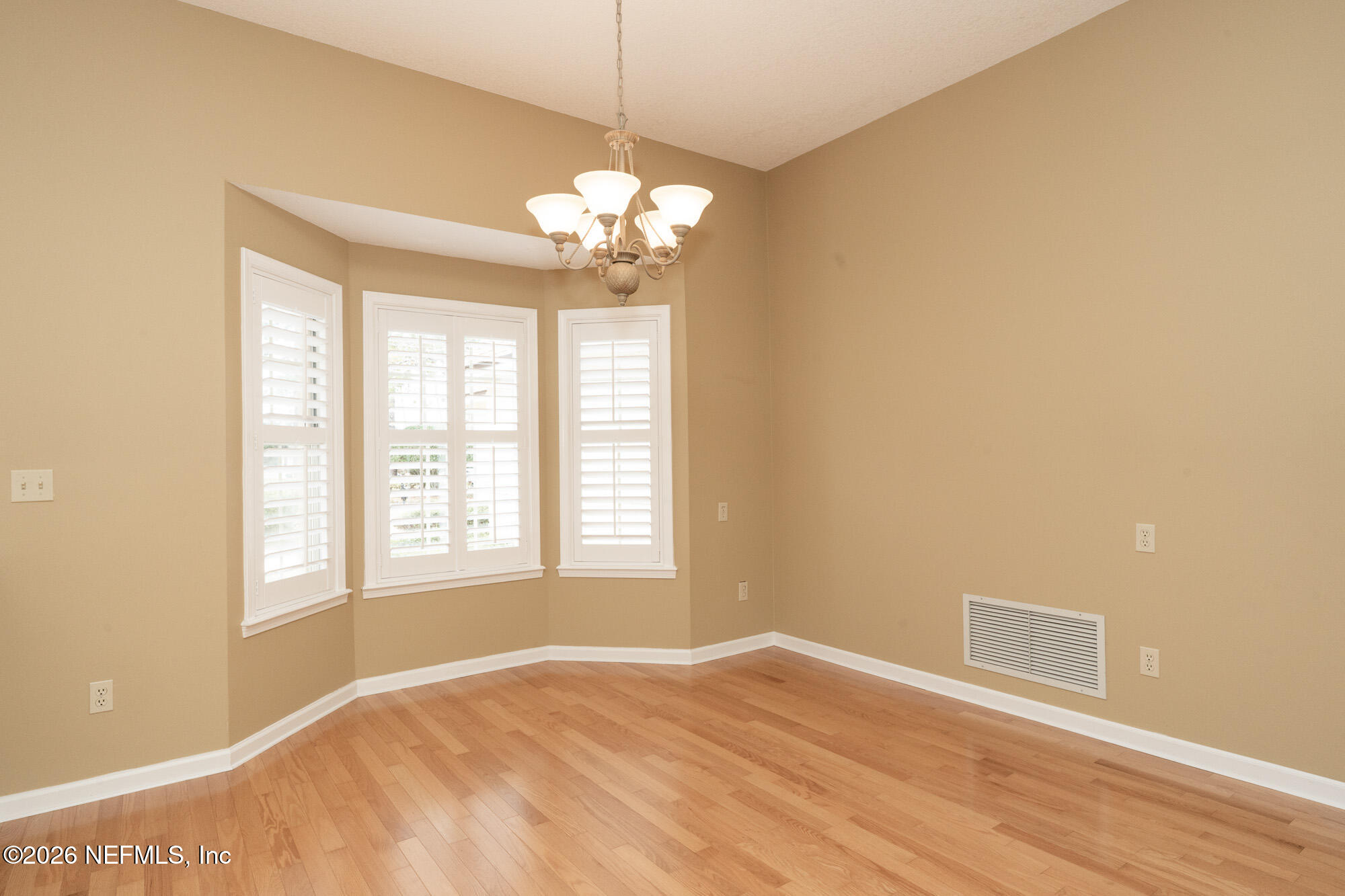 13177 Cricket Cove Road North Jacksonville, FL 32224 - Photo 10 of 39 a view of an empty room with a window