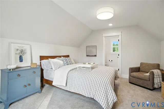 a bedroom with a bed and furniture