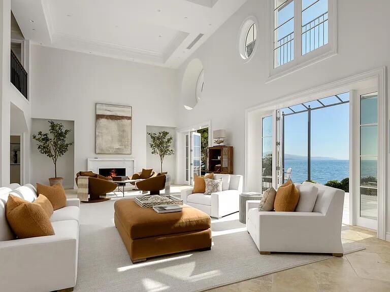 1803 Fernald Point Lane Santa Barbara, CA 93108 - Photo 4 of 16 a living room with furniture a large window and a chandelier