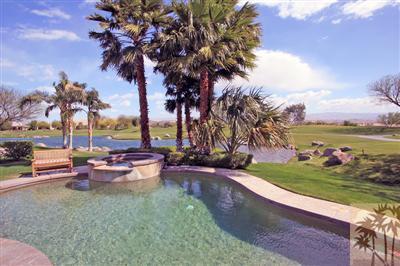 an outdoor space with patio swimming pool and outdoor seating