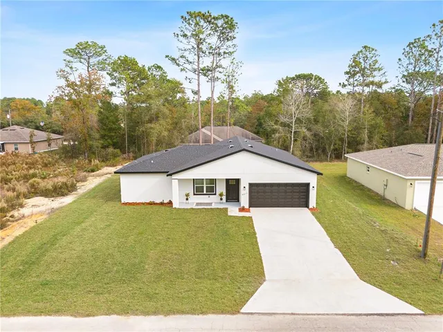 a vase of flowers sitting on a table