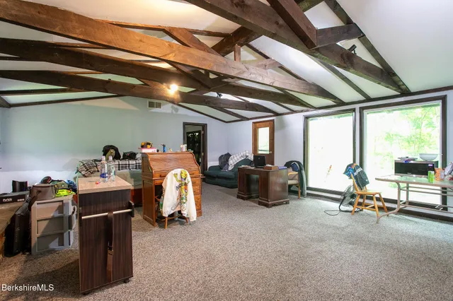 a view of gym equipment with windows