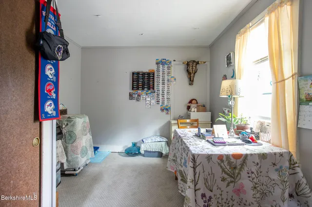 a room with furniture and a window