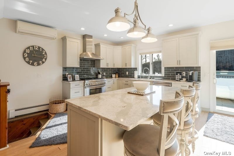 a large kitchen with a table and chairs