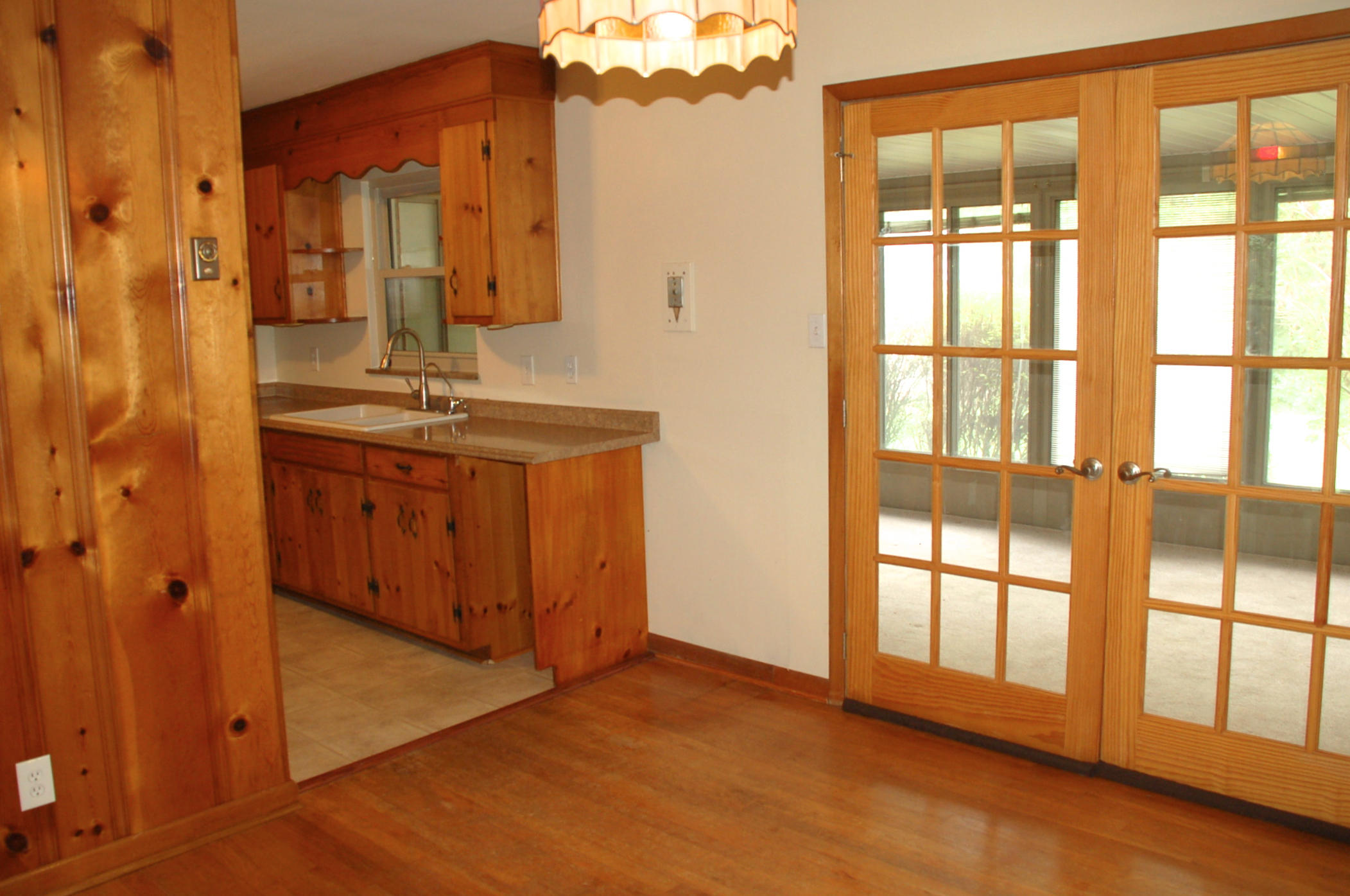4317 Deerfield Road Knoxville, TN 37921 - Photo 6 of 20 french doors to sunroom