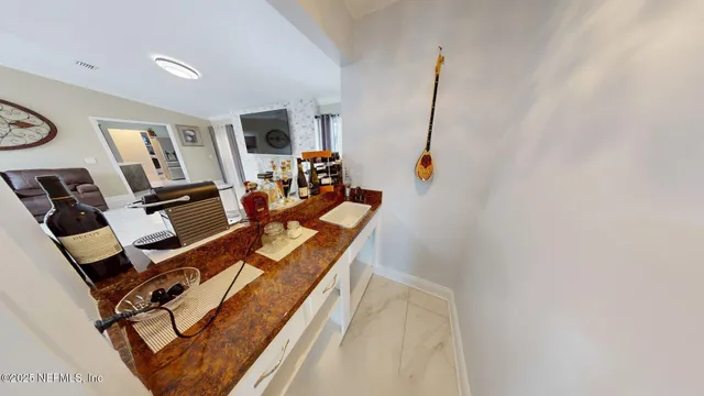 a bedroom with a bed and a chair