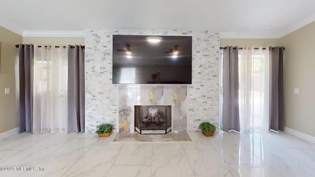a kitchen with stainless steel appliances granite countertop a sink and a refrigerator