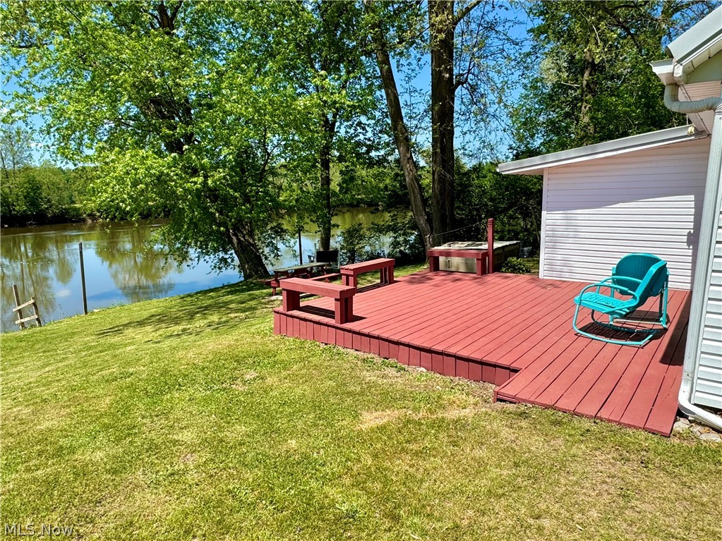 8551 South River Road Blue Rock, OH 43720 - Photo 23 of 43 Deck with a yard and a water view