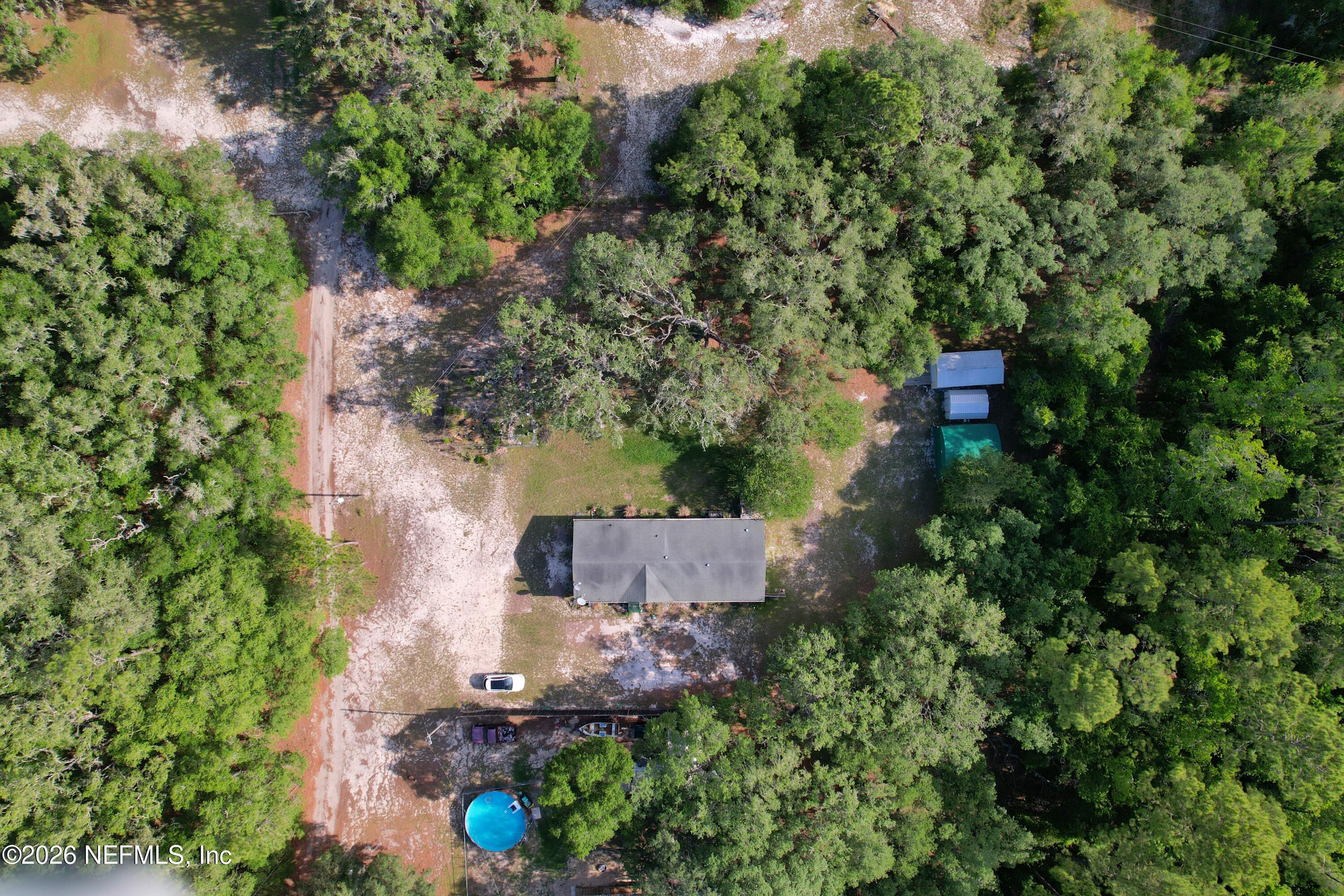 136 Short Pine Road Hawthorne, FL 32640 - Photo 27 of 39 an aerial view of a house with a yard