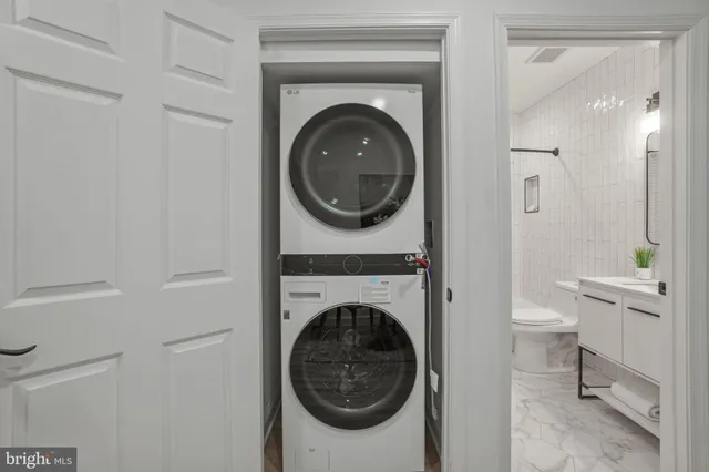 a view of a bathroom with a washer and dryer