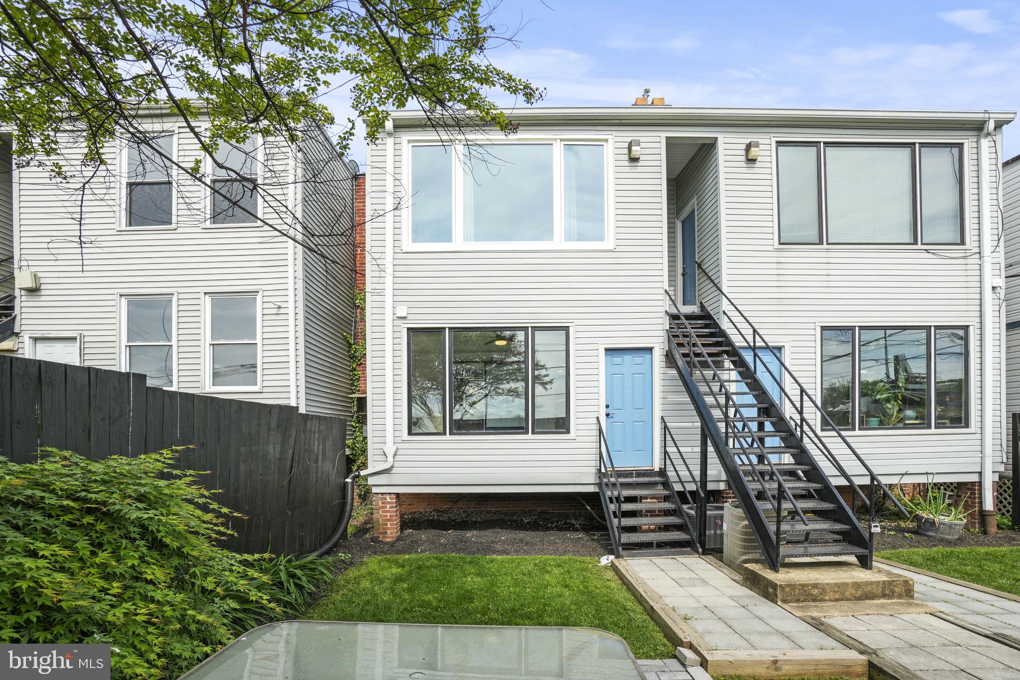 1653 Trinidad Avenue Northeast, Unit 2 Washington, DC 20002 - Photo 15 of 17 front view of a house with a yard