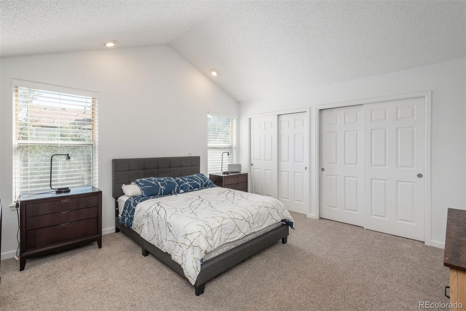 9222 Buttonhill Court Highlands Ranch, CO 80130 - Photo 25 of 44 a bedroom with a bed and window