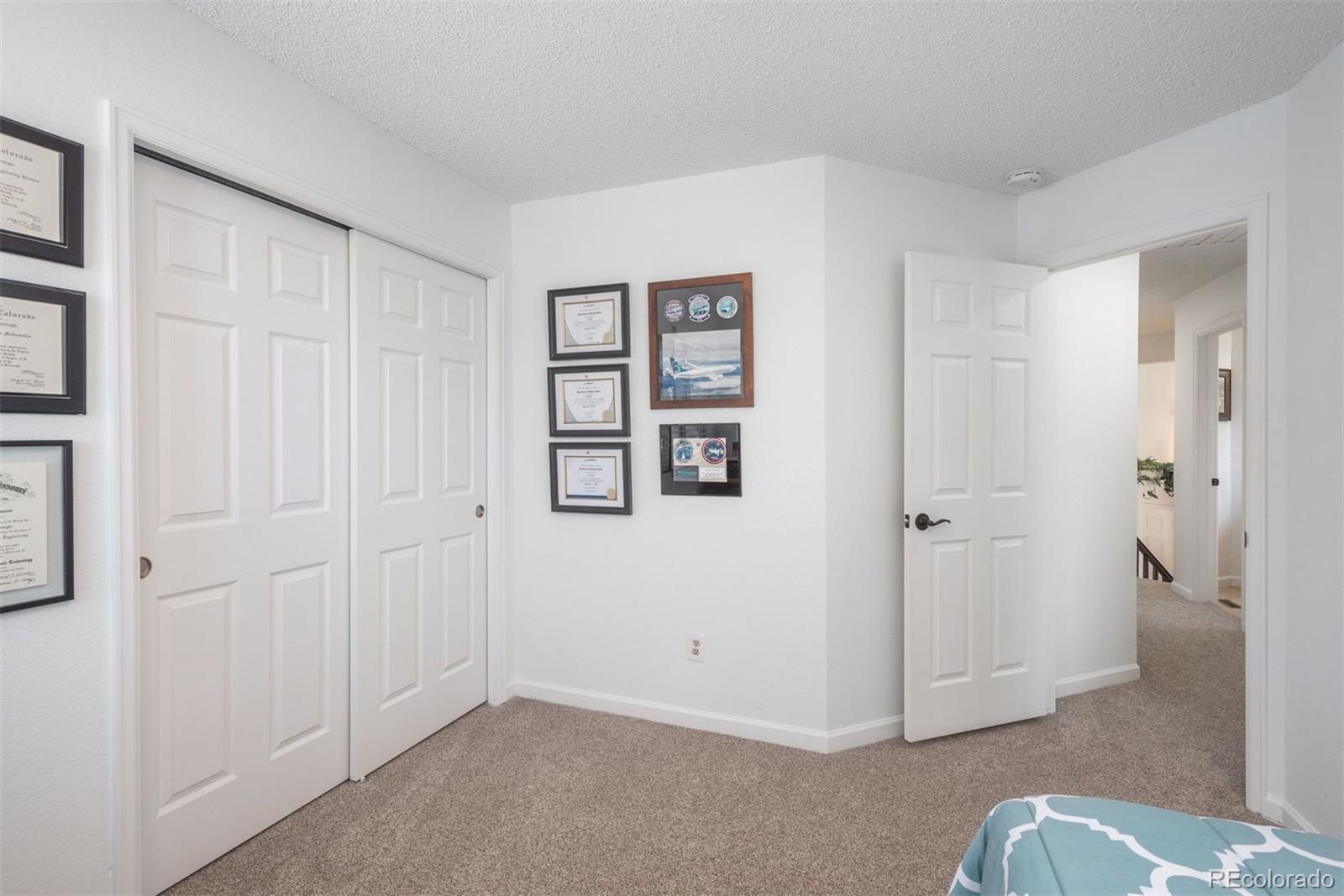 9222 Buttonhill Court Highlands Ranch, CO 80130 - Photo 32 of 44 an empty room with windows