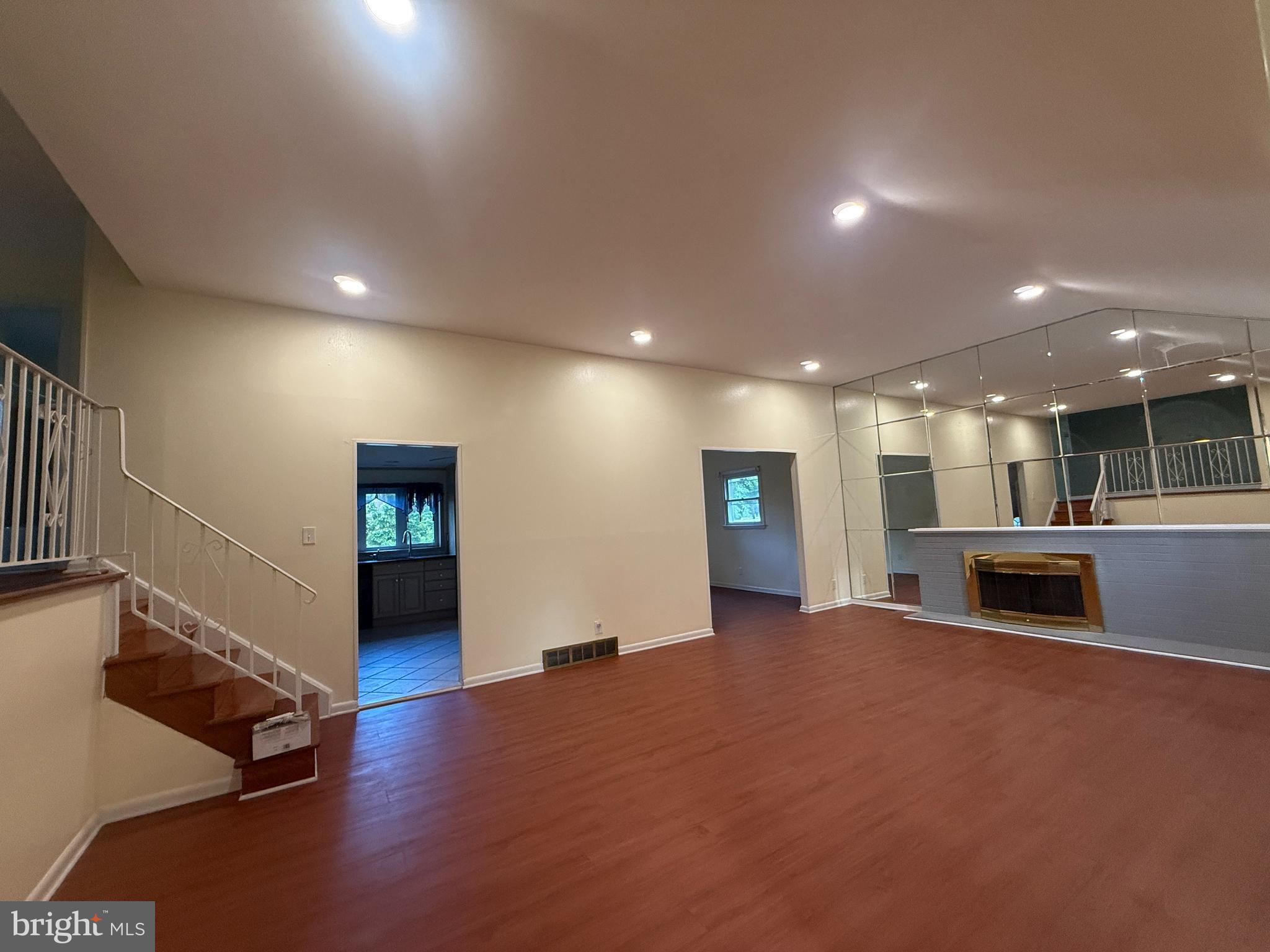 118 Spring House Road Cherry Hill, NJ 08002 - Photo 3 of 22 a view of empty room with wooden floor